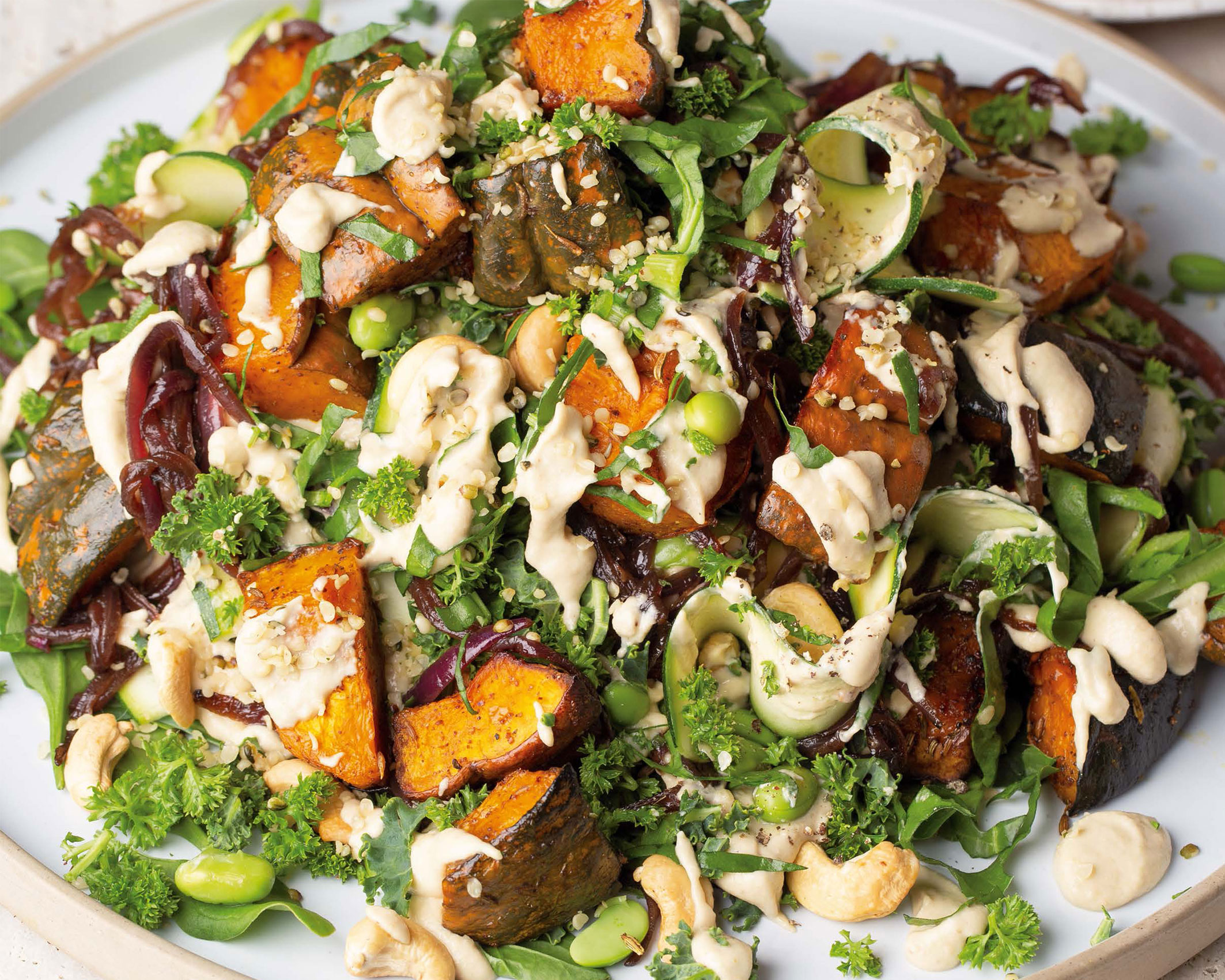 Sumac Pumpkin, Caramelised Onion and Greens with Garlic Dressing by Sophie Steevens